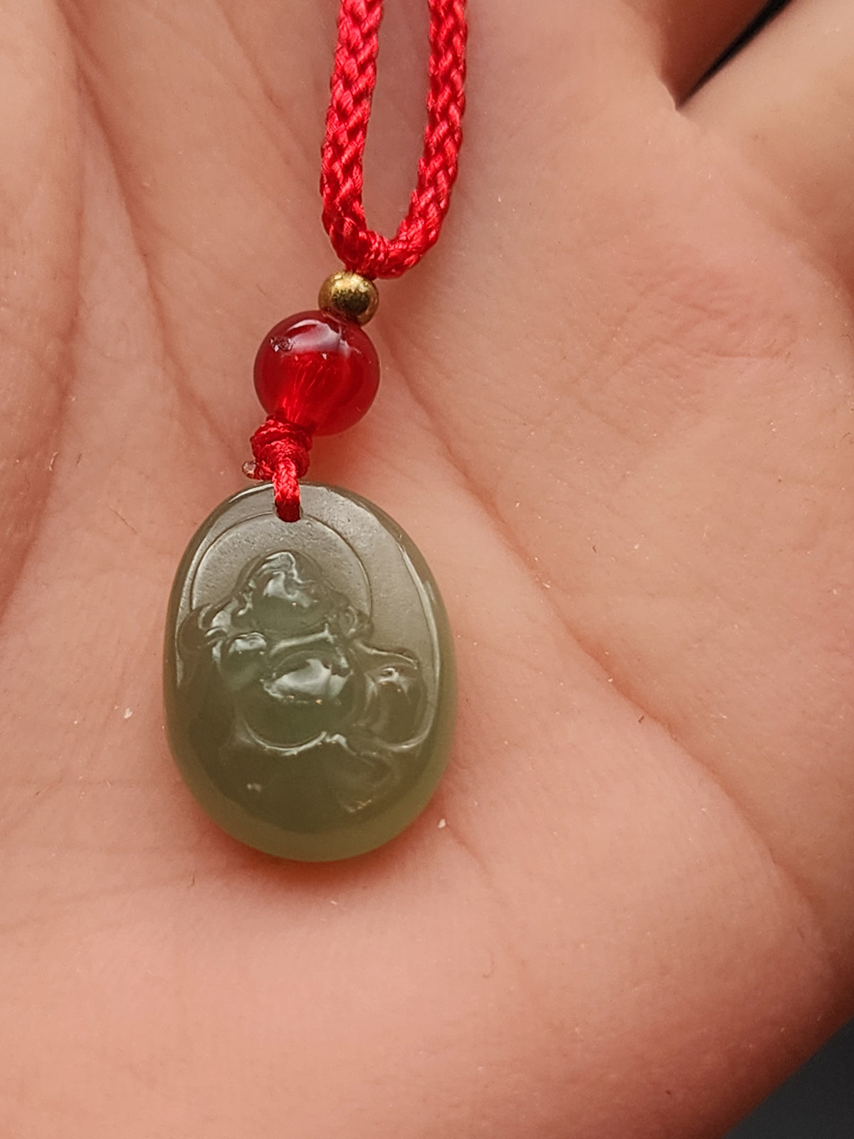 Natural Celadon Green Nephrite Jade Carved Laughing Buddha Oval Pendant - (Untreated)